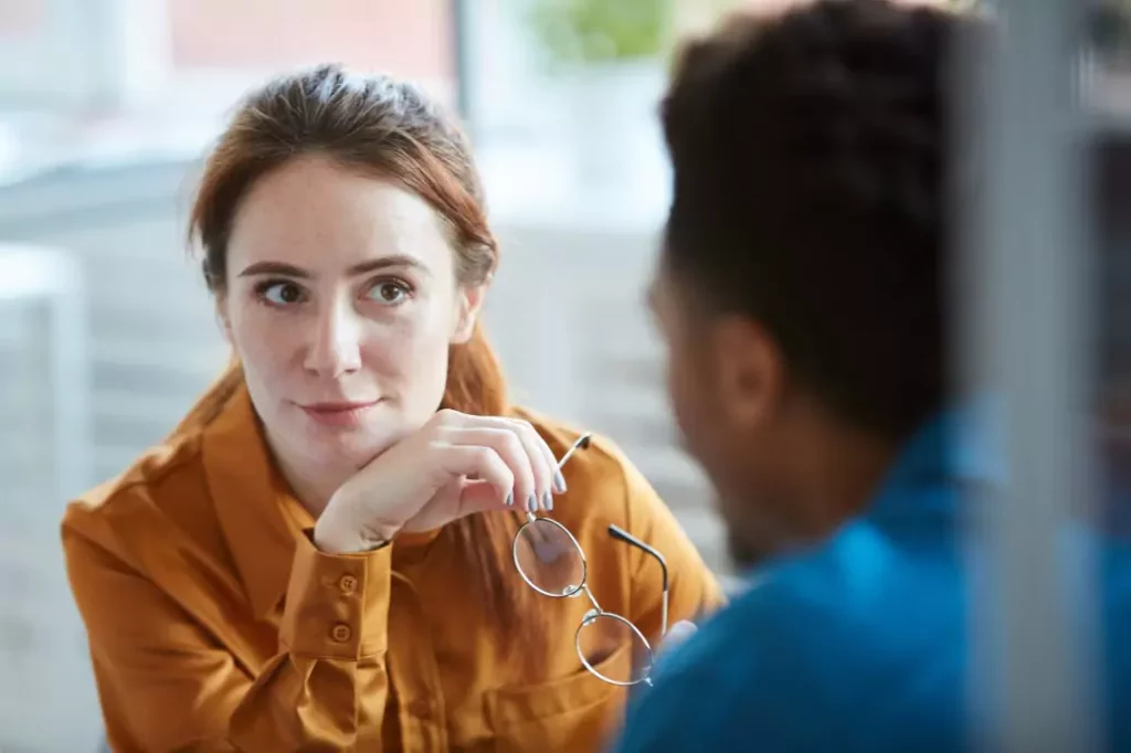 Manager who has completed a Mental Health First Aid Course talking with an employee
